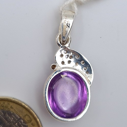 46 - A pretty Amethyst stone pendant, set with Diamonds. Amethyst is a 7.16 carats with an array of 0.18 ... 