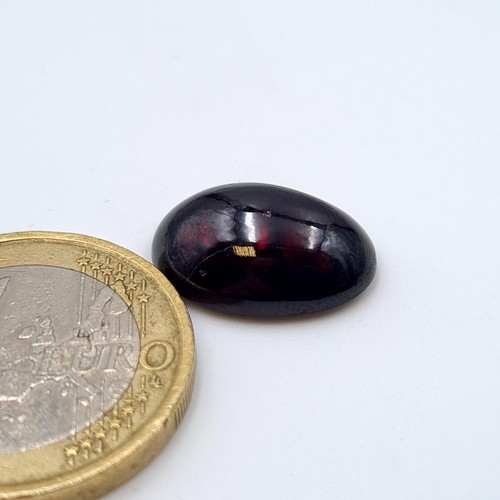 838 - Two certified Garnet stones, comprising of a Alamndite example of a large 10.9 carats. Together with... 