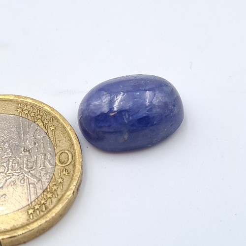 840 - Two certified stones, including a natural Tanzanite of 10.54 carats and a Blue Sapphire of 7.71 cara... 