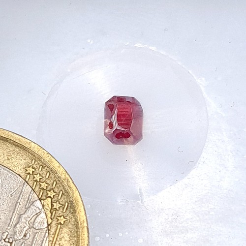 846 - Two certified gem stones, including a deeply hued natural Ruby of .057 carats. Together with a furth... 