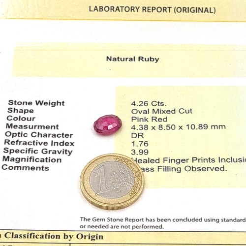 846 - Two certified gem stones, including a deeply hued natural Ruby of .057 carats. Together with a furth... 