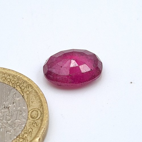 846 - Two certified gem stones, including a deeply hued natural Ruby of .057 carats. Together with a furth... 