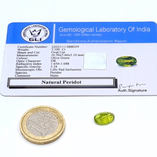 847 - Two certified gem stones, including a pretty natural Peridot of 3.1 carats. Together with a fabulous... 