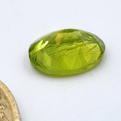 847 - Two certified gem stones, including a pretty natural Peridot of 3.1 carats. Together with a fabulous... 