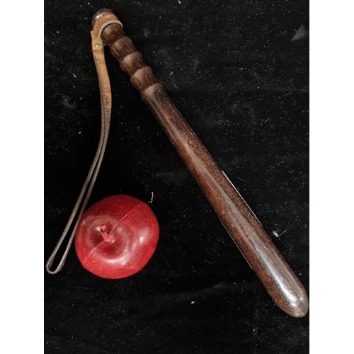 708 - Star lot : A genuine period Royal Irish Constabulary police baton. With carved detail and leather tr... 