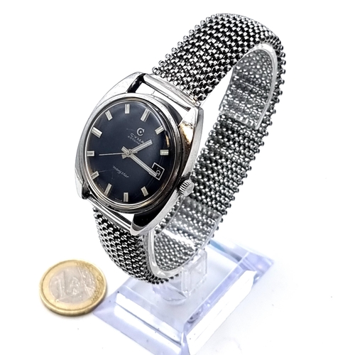 18 - Star Lot : A 1950's vintage Cyma Navystar wrist watch, set with expandable metal strap. The Navystar... 