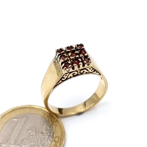 42 - A beautiful vintage Bohemian style silver gilt Garnet stone ring, set with a geometric wide band set... 