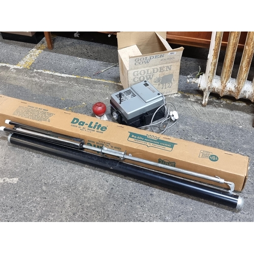 493 - Two photography items including a vintage Aldis Tru-Lite Quartz Iodine 24 photo slide projector alon... 