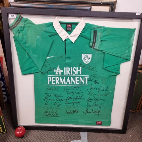 80 - Star Lot  : A framed display of a signed Irish 6 nations  Rugby Jersey dating to the early 2000's in... 