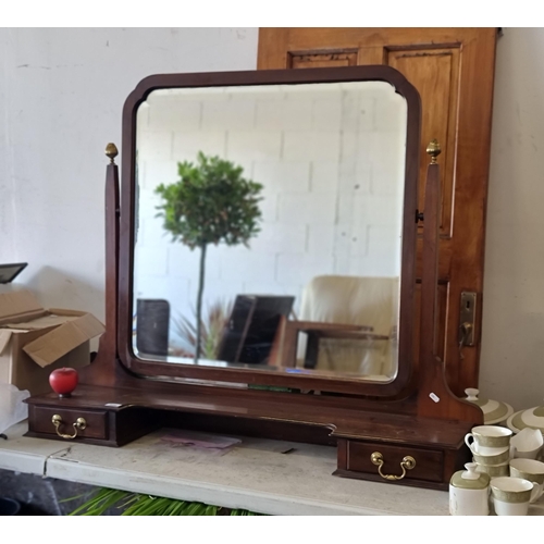 896 - A very large vintage dressing table swing mirror. This example features a bevelled mirror to centre ... 