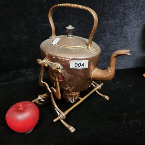 904 - A very attractive example of a late 19th Century copper spirit kettle with burner and stand.