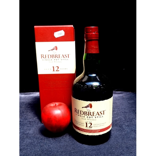 949 - A sealed 70cl bottle of Redbreast single pot still Irish whiskey aged 12 years in presentation case.