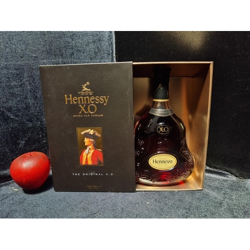 958 - Star lot : A sealed 70cl bottle of Hennessy Cognac in a lovely presentation case. There is a video o... 