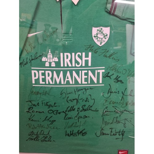 80 - Star Lot  : A framed display of a signed Irish 6 nations  Rugby Jersey dating to the early 2000's in... 