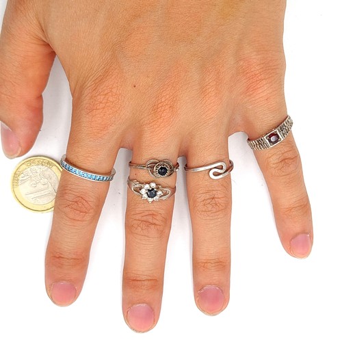 34 - A collection of five sterling silver hallmarked gem set rings, comprising of two size M examples, on... 