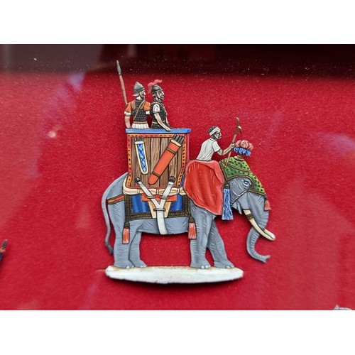 106 - A glazed display box of handpainted German flat figures of a military theme. Beautifully painted wit... 