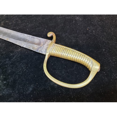 712 - Star lot : An antique Napoleonic French infantry hanger sword with a curved blade stamped 'F.G.S.'. ... 