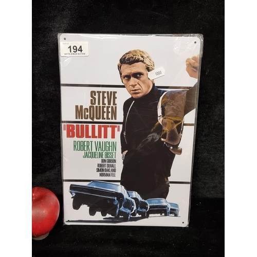 194 - A cast metal vintage style advertising poster for Bullitt. A hit film starring Steve McQueen and rel... 