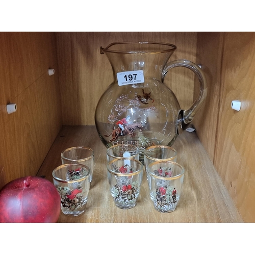 197 - A fabulous complete set of pitcher jug and six matching shot glasses with a hunt and equestrian them... 