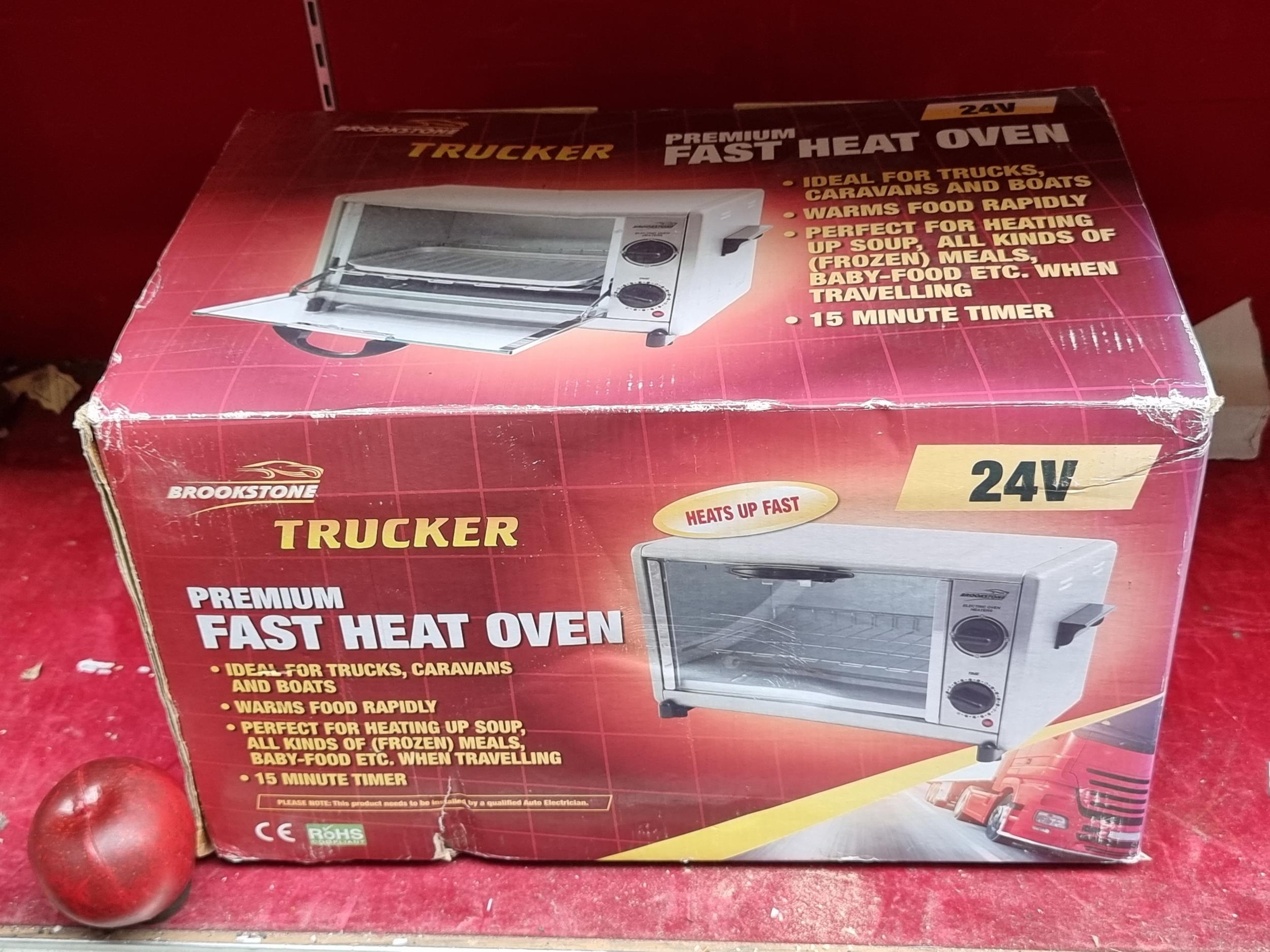 An as new in box Brookstone Trucker Premium Fast Heat Oven. for