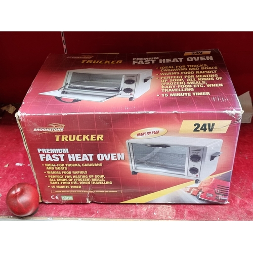 An as new in box Brookstone Trucker Premium Fast Heat Oven. for