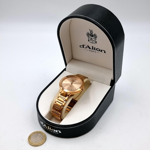 553 - A D'Alton of Paris rose gold wrist watch and bracelet, set with baton dial and sweep second hand. En... 