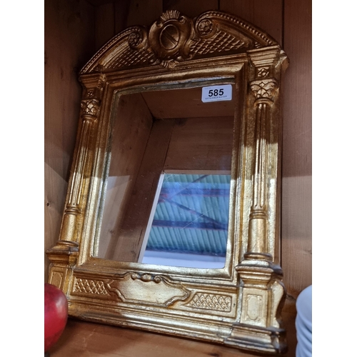 585 - A neat size antique style wall mirror surmounted by a shield pediment and Corinthian pilasters in a ... 