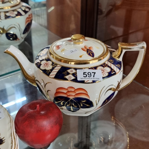 597 - A large striking Arklow pottery teapot. A really lovely vintage example in a red and blue palette wi... 