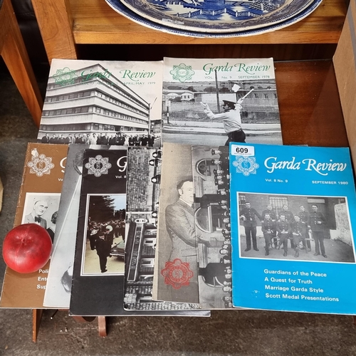 609 - A selection of nine vintage volumes of 'The Garda Review Journal' dating to the 1970s. Filled with f... 