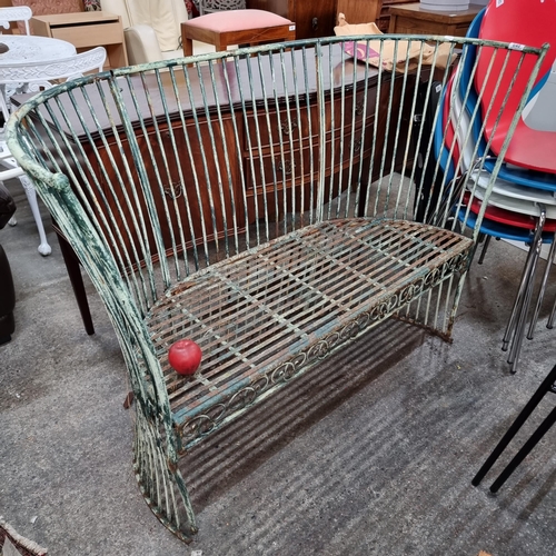 648 - A charming antique metal spindle back garden bench with a tall backrest which reaches the floor. Als... 