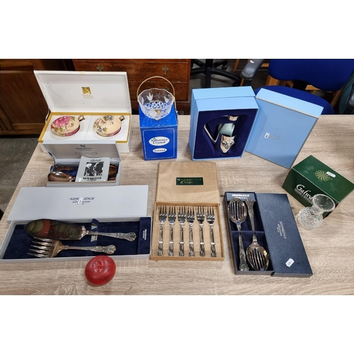 710 - An excellent resale lot of old new stock homeware. Including Newbridge cutlery, Irish crystal etc. A... 