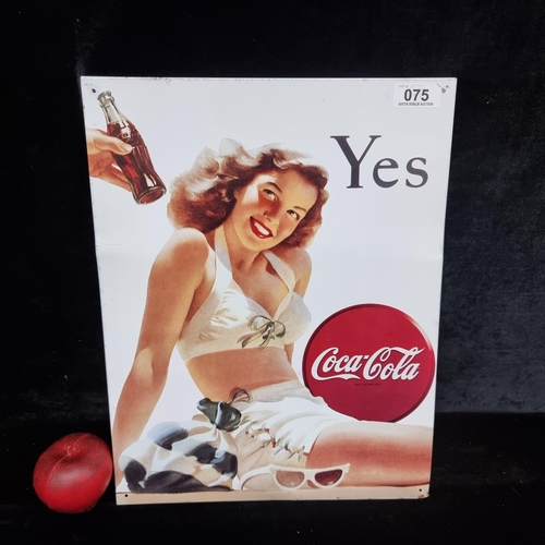 75 - A rectangular metal wall sign advertising Coca-Cola featuring 50's style pin up girl reading 'YES'.