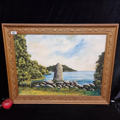 93 - A vibrant oil on board painting featuring a landscape scene of an early Christian round tower overlo... 