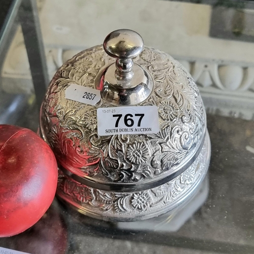 767 - A very attractive large silver toned table top reception bell with beautiful foliate design. A good ... 