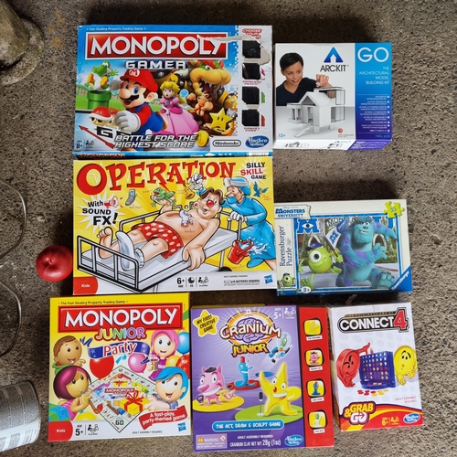 785 - Seven family board games including Operation, Monopoly Junior, Cranium Junior, Connect four and more... 