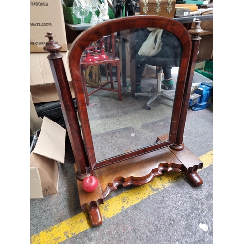 818 - Star Lot - A large antique mahogany dressing table swing mirror. This beautiful example features and... 