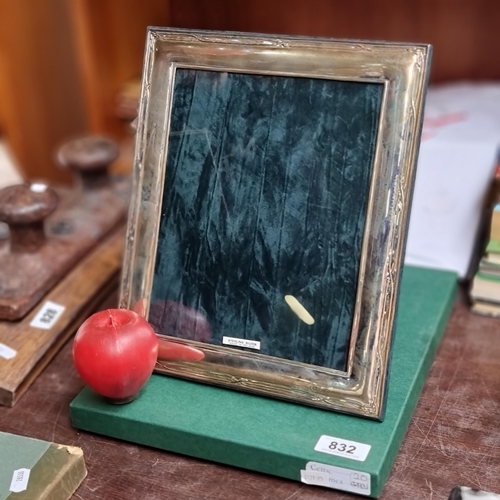 832 - A lovely boxed example of a large sterling silver photo-frame. Featuring a subtle Celtic knot border... 