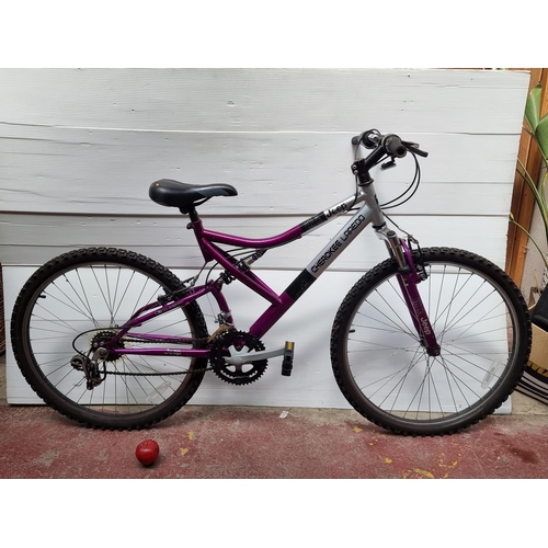 856 - A Jeep Cherokee Laredo mountain bicycle with Epoch Sport gears. In a purple and silver finish. Good ... 