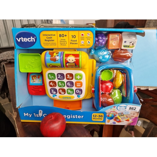 862 - An as new in box Vtech 'My 1st Cash Register' set with colourful features.