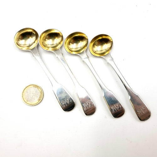 884 - A collection of four early Georgian sterling silver fiddle pattern cruet spoons, set with initialled... 