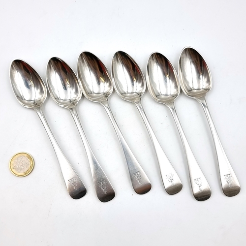 896 - A matching set of six heavy sterling silver teaspoons. Each etched with a dragon and flower to finia... 