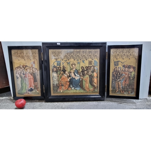 741 - A 19th century religious triptych with two hinged panels opening to reveal another panel, all three ... 