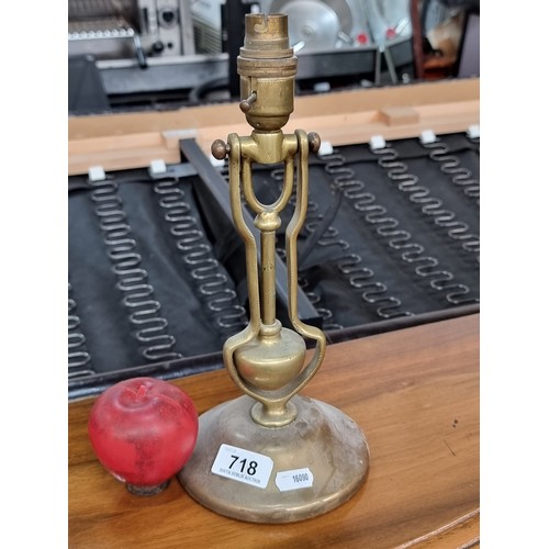 718 - A really lovely example of a weighted brass ship's gimbal lamp. This lovely electrified example func... 