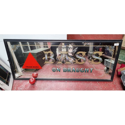 228 - Star Lot - A large original advertising mirror for Bass lager. Featuring a red trademark triangle an... 