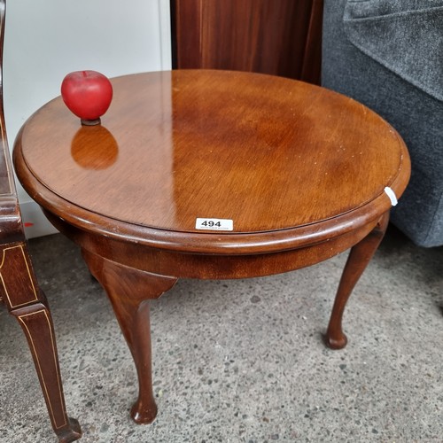 494 - An attractive vintage coffee table with cabriole legs and a nice quality to the wood. H 44 x D 60