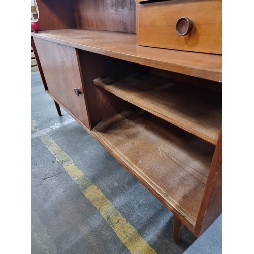 666 - Star Lot : A stunning vintage Mid Century Modern teak display cabinet with display shelf to top boas... 