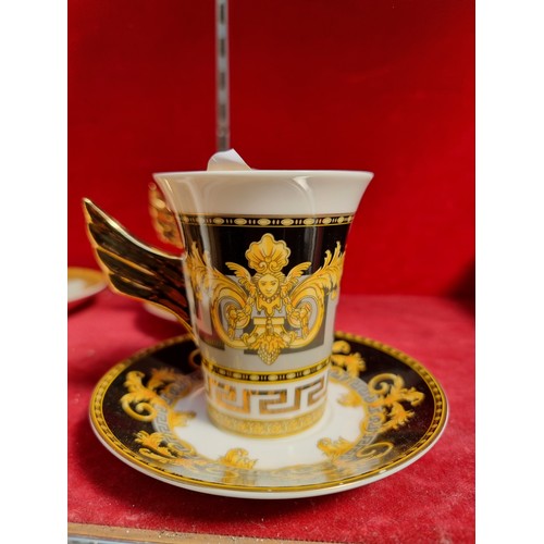 276 - An eight-piece set comprising of four cups and matching saucers. After the Versace Medusa Demitasse ... 