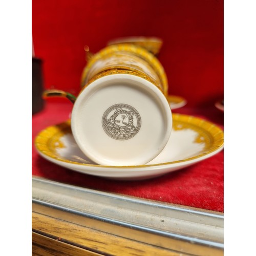 276 - An eight-piece set comprising of four cups and matching saucers. After the Versace Medusa Demitasse ... 