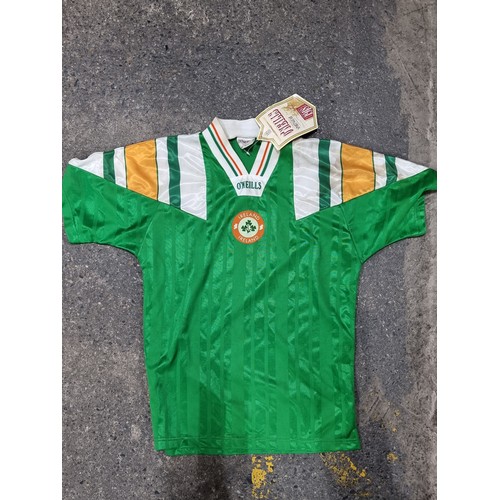 725 - A retro new old stock O'Neills Irish football children's jersey with an original tag. For ages 10-11... 