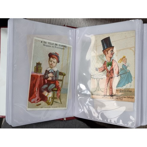 731 - A neat album of approximately seventy 19th century French trade cards. Featuring gorgeous illustrati... 